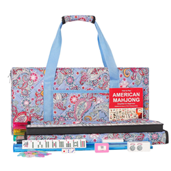American Mahjong set with tiles, racks, dice, and rulebook, all in a patterned carrying case.